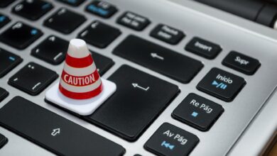 white caution cone on keyboard