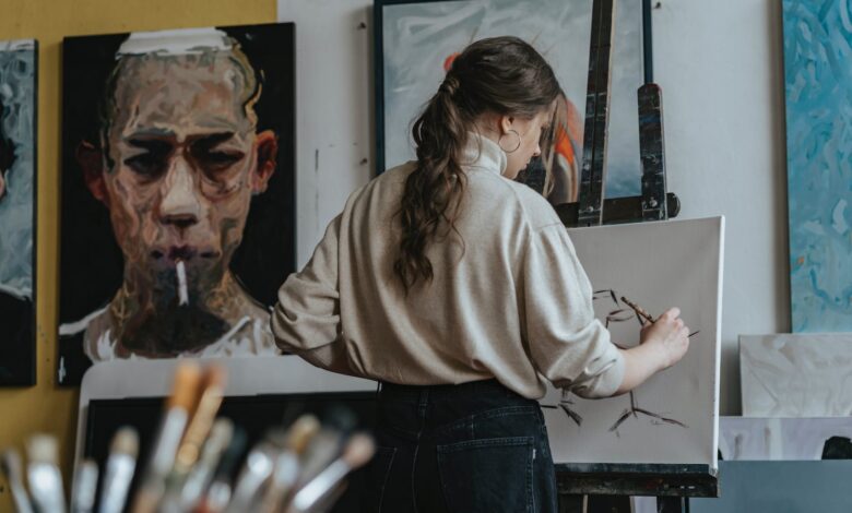 close up shot of a woman painting