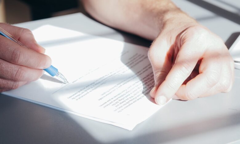 a person signing a document