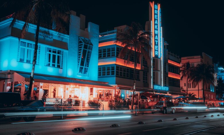 vehicle light trails in front of the breakwater hotel at night